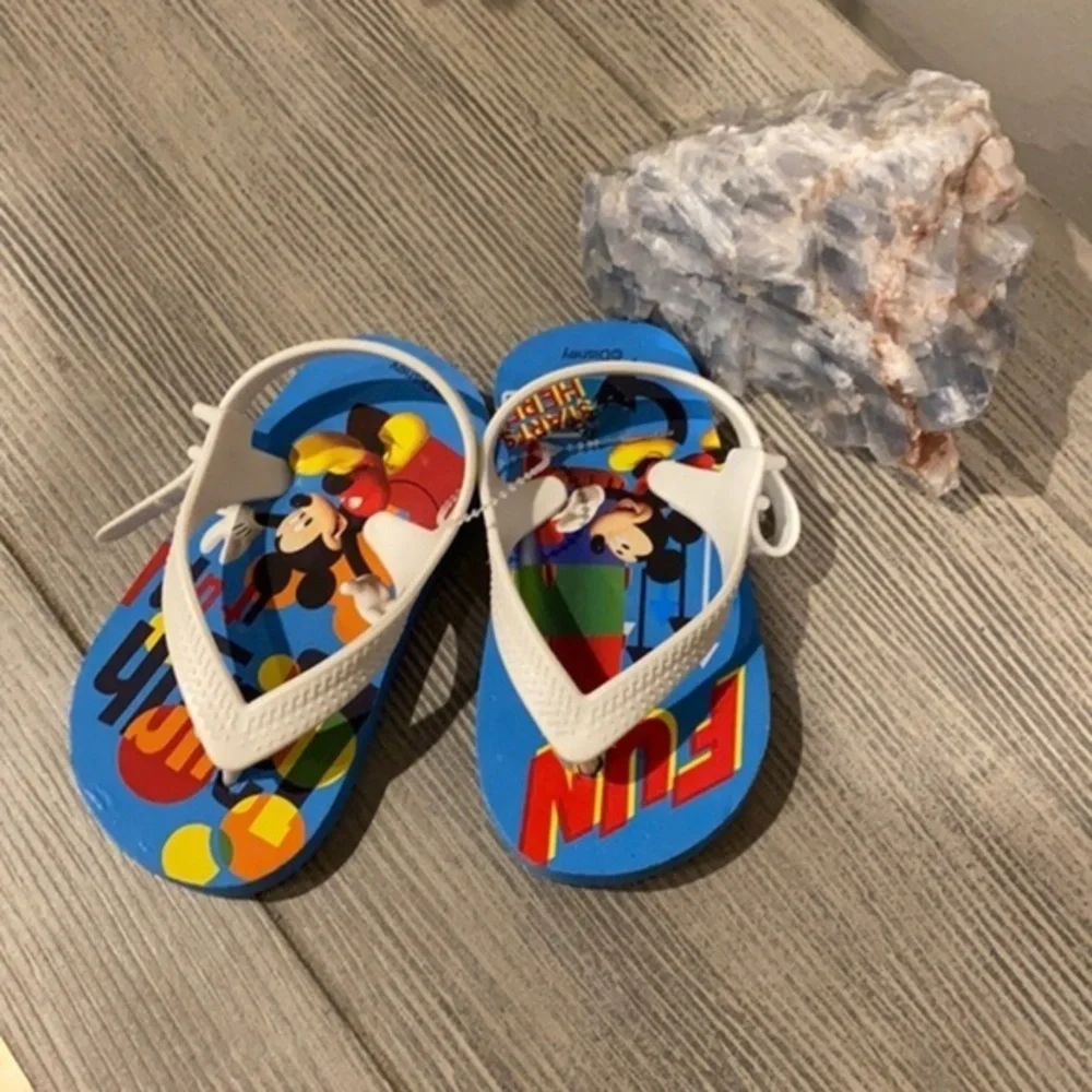 NWOT Disney flip flops for infants